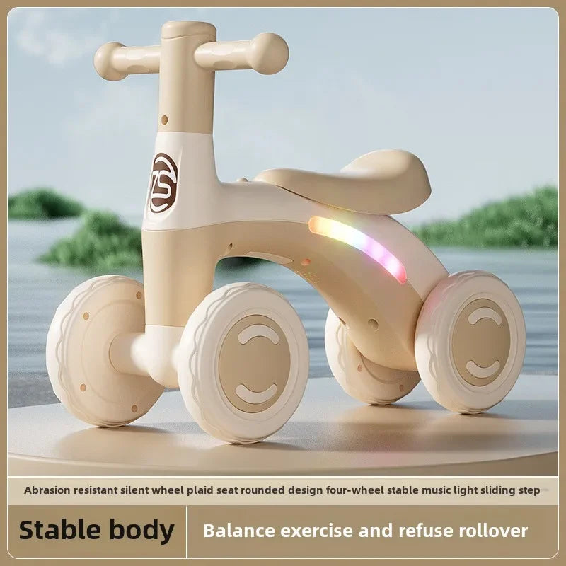 Anti-Tip Baby Balance Bike Ages 1-3 4-Wheel Silent Glider Walker Toy Toddler Training Ride-On with Safety Wheels Indoor Outdoor